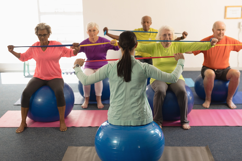 Group of seniors in an exercise room being physically active